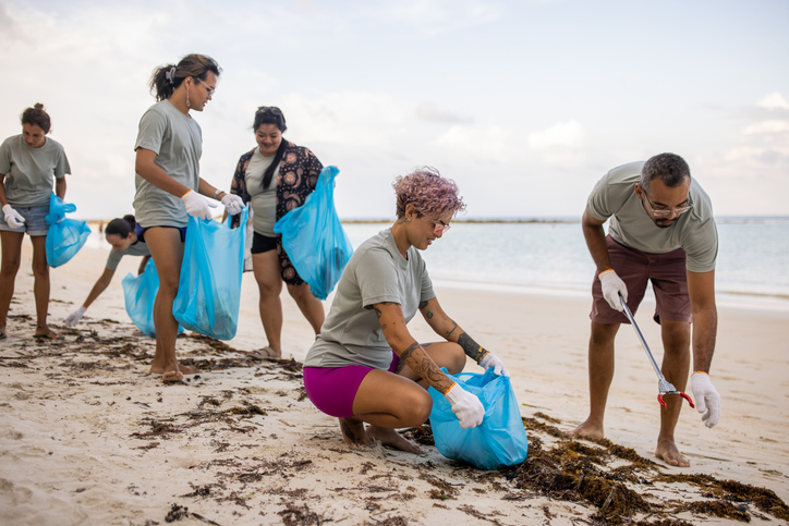 Foundation For Humanity activists cleaning the beach